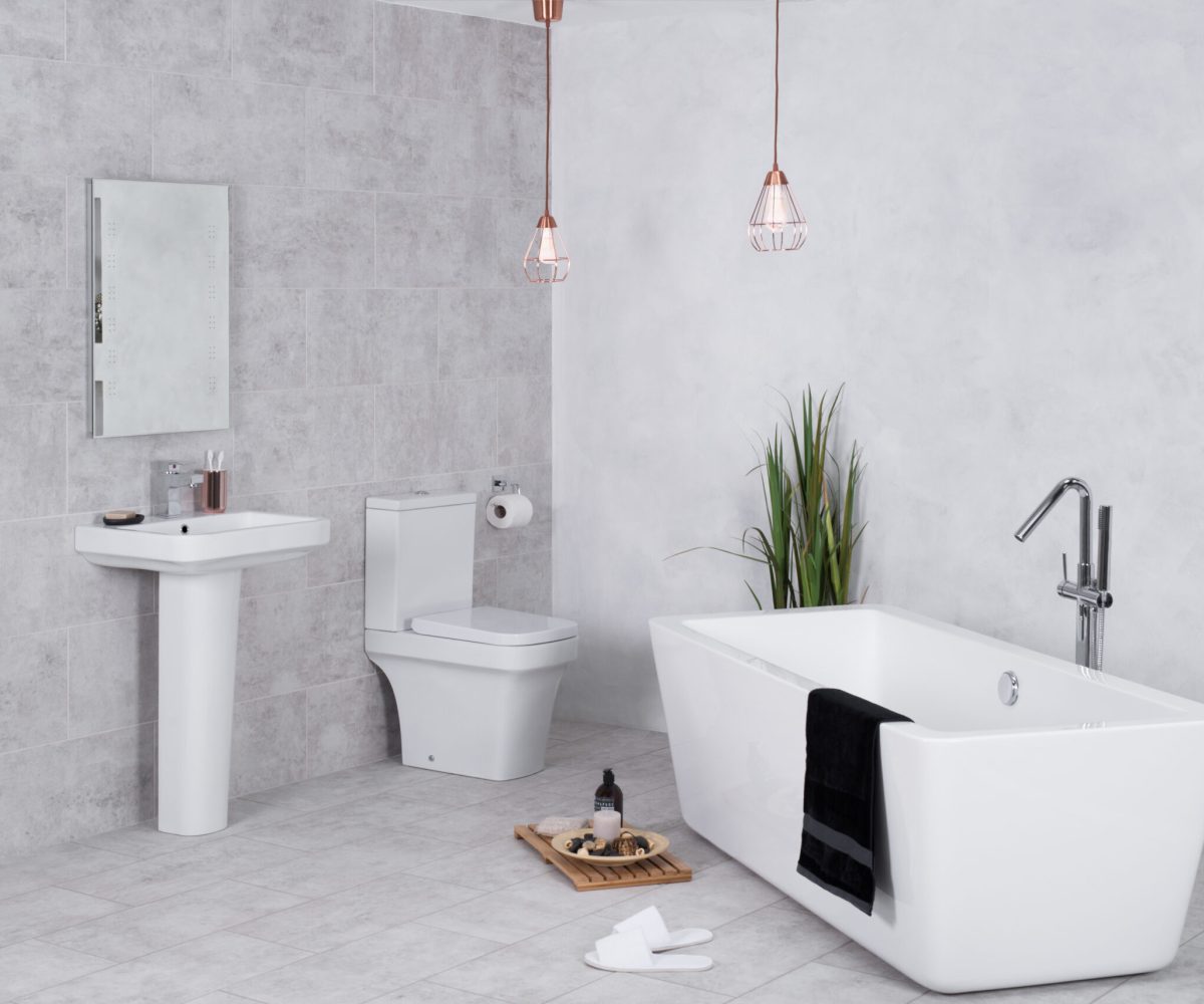 A modern bathroom with a toilet and bathtub