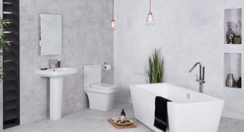 A modern bathroom with a toilet and bathtub